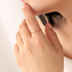ANILLO . FIGURAS EN BAÑO DE ORO