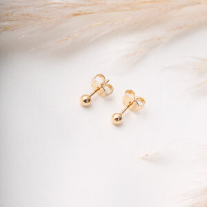 TOPO BORLA Y POMPON EN ORO LAMINADO