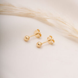 TOPO BORLA Y POMPON EN ORO LAMINADO