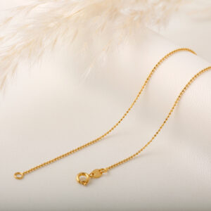 CADENA . CRISTAL- BALIN EN ORO LAMINADO