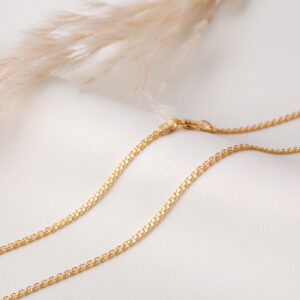 CADENA . LONG CURB EN ORO LAMINADO