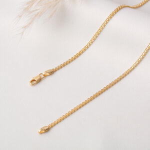 CADENA . LONG CURB EN ORO LAMINADO