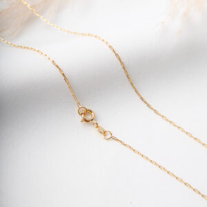 CADENA . FIGURAS EN ORO LAMINADO