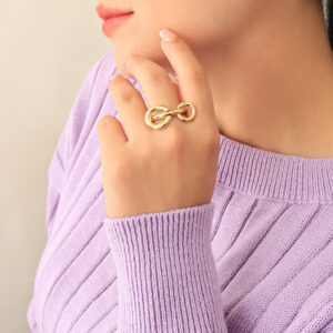 ANILLO .  DIJES EN BAÑO DE ORO