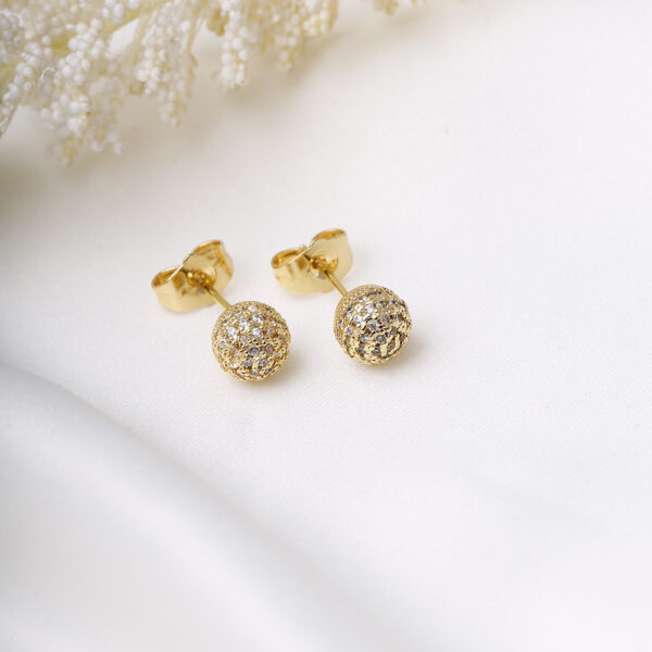 TOPO  PIEDRAS EN BAÑO DE ORO