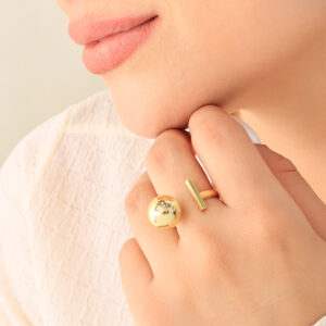 ANILLO .  DIJES EN BAÑO DE ORO