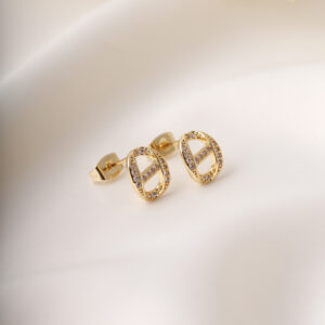 TOPO  PIEDRAS EN BAÑO DE ORO