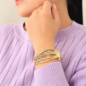 BRAZALETE . C/ PIEDRAS EN BAÑO DE ORO