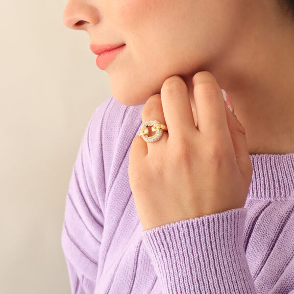 ANILLO .  CRISTAL EN BAÑO DE ORO