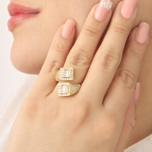 ANILLO . FIGURAS EN BAÑO DE ORO