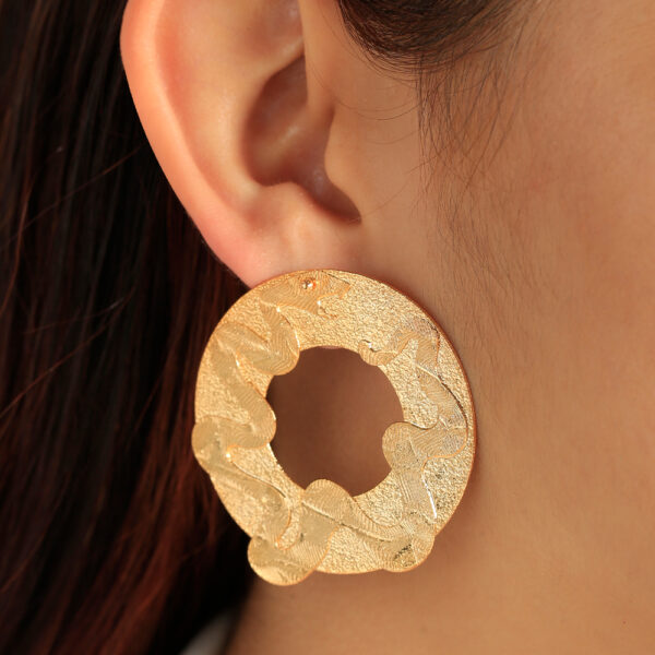 TOPO  CIRCON EN BRONCE