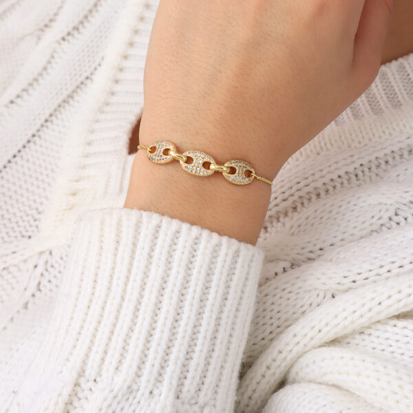 PULSERA . FIGURAS EN BAÑO DE ORO