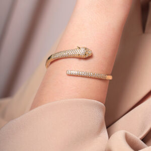 BRAZALETE . C/ PIEDRAS EN BAÑO DE ORO