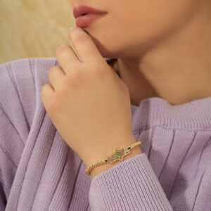 PULSERA . FIGURA CIRCON EN BAÑO DE ORO