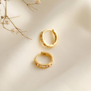 HUGGIES  CIRCON EN ORO LAMINADO