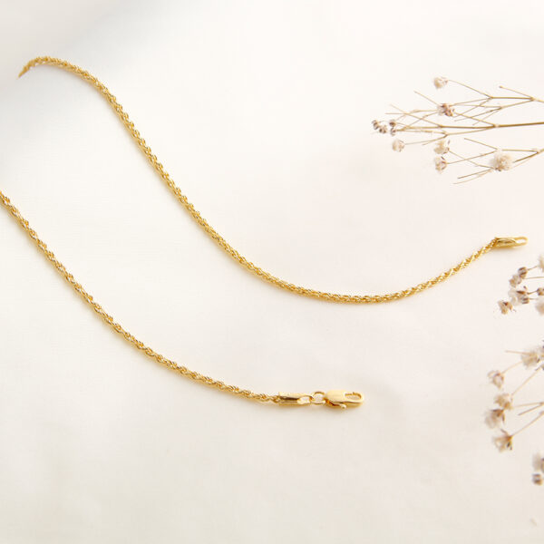 CADENA . LAZO EN ORO LAMINADO