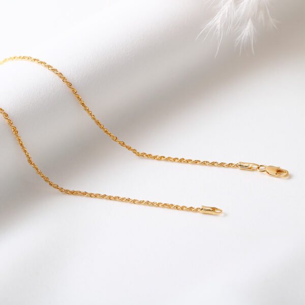 CADENA . LAZO EN ORO LAMINADO