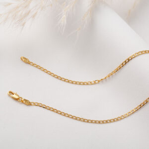 CADENA . CORTO  NACAR Y PIEDRAS EN ORO LAMINADO
