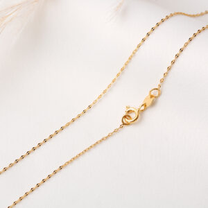 CADENA . FIGURAS EN ORO LAMINADO