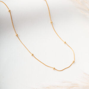 CADENA . MANO EN ORO LAMINADO