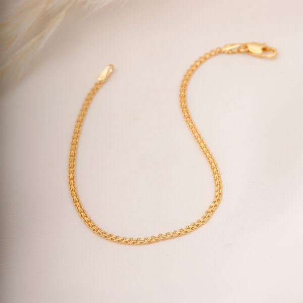 PULSERA . LONG CURB EN ORO LAMINADO