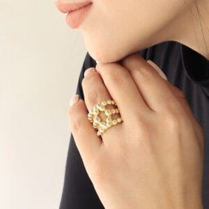 ANILLO . C/ DIJES EN BAÑO DE ORO