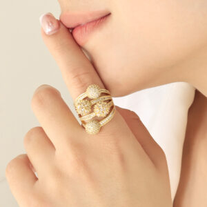 ANILLO .  CRISTAL EN BAÑO DE ORO