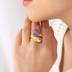 ANILLO . FIGURAS EN BAÑO DE ORO