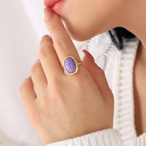 ANILLO . FIGURAS EN BAÑO DE ORO