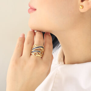 ANILLO .  CRISTAL EN BAÑO DE ORO
