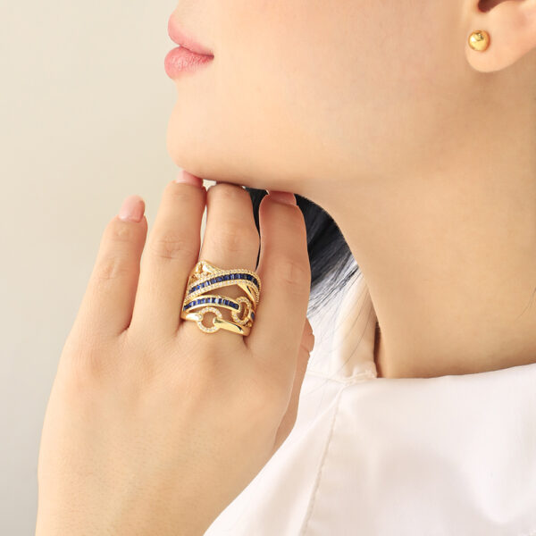ANILLO .  CRISTAL EN BAÑO DE ORO