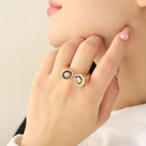 ANILLO .  CRISTAL EN BAÑO DE ORO