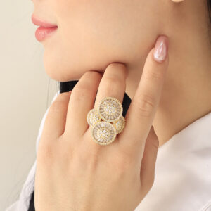 ANILLO .  CRISTAL EN BAÑO DE ORO