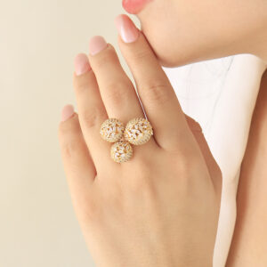 ANILLO .  CRISTAL EN BAÑO DE ORO