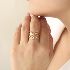 ANILLO .  CRISTAL EN BAÑO DE ORO