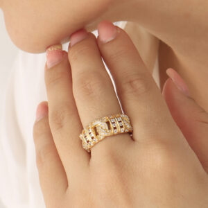 ANILLO . FIGURAS EN BAÑO DE ORO