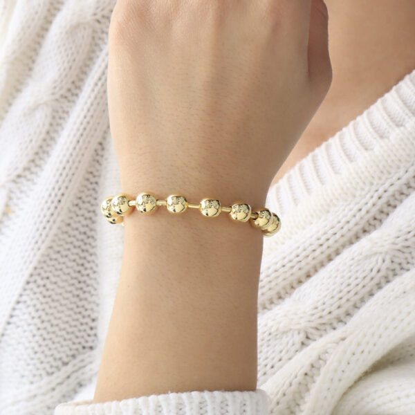 PULSERA . BOLITA 70CM EN BANO DE ORO