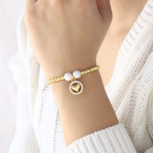 PULSERA . FIGURAS PIEDRAS EN BANO DE ORO