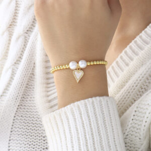 PULSERA . FIGURAS PIEDRAS EN BANO DE ORO