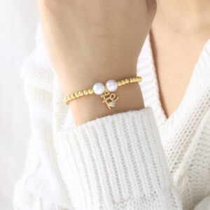 PULSERA . FIGURAS PIEDRAS EN BANO DE ORO