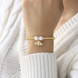 PULSERA . FIGURAS PIEDRAS EN BANO DE ORO