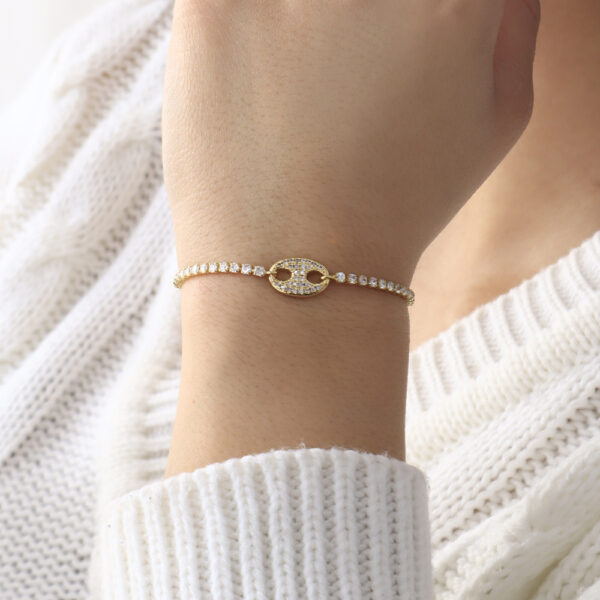 PULSERA .  CRISTAL EN BANO DE ORO