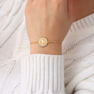 PULSERA .  DIJES Y PIEDRAS EN BANO DE ORO