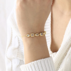PULSERA . FIGURAS PIEDRAS EN BANO DE ORO