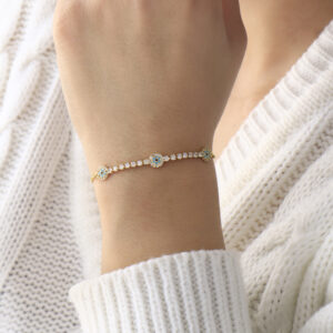 PULSERA . FIGURAS PIEDRAS EN BANO DE ORO