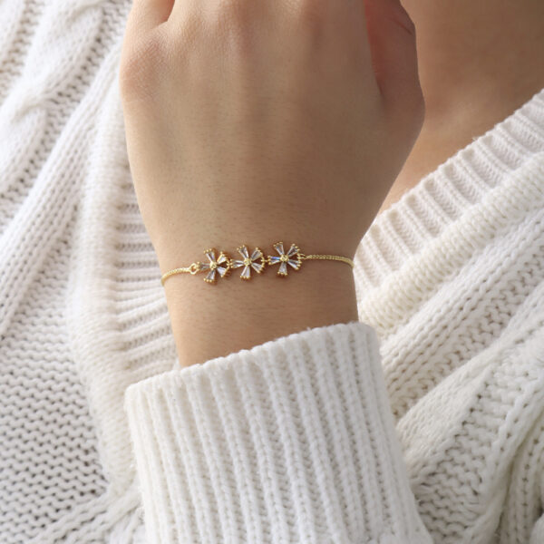 PULSERA . FIGURAS C/PIEDRAS EN BAÑO DE ORO
