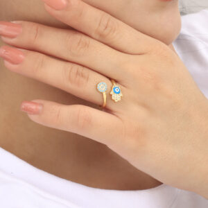 ANILLO . C/ PIEDRAS EN BAÑO DE ORO