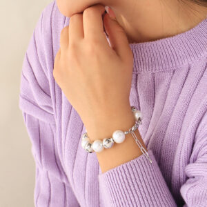 PULSERA .  BALINES Y PERLAS EN BANO DE RODINADO