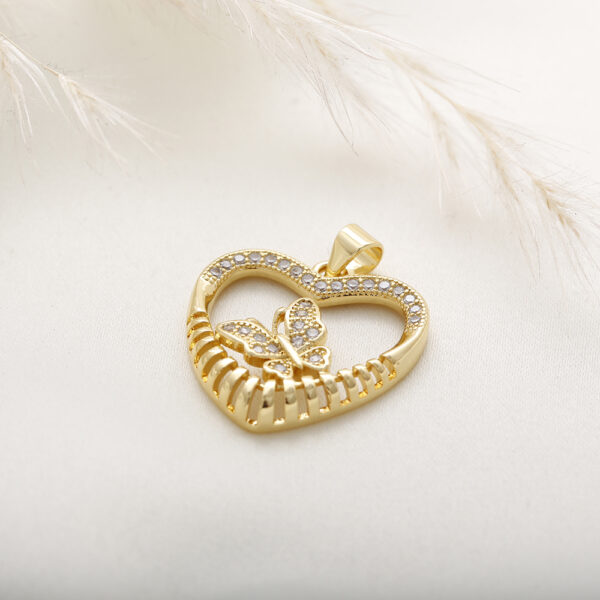 DIJE .  PIEDRAS EN BANO DE ORO