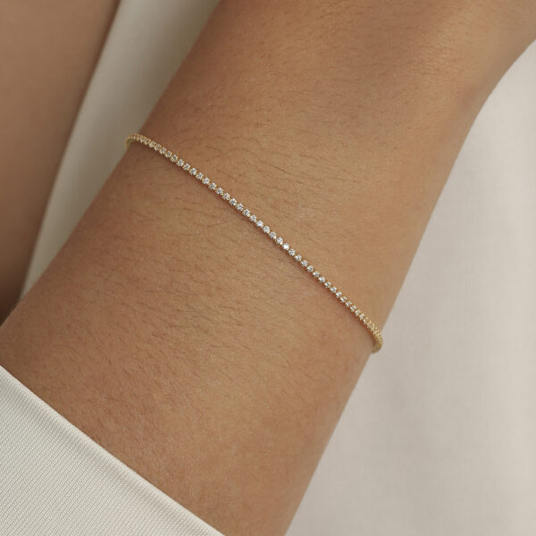 PULSERA . ARGOLLA EN ORO LAMINADO